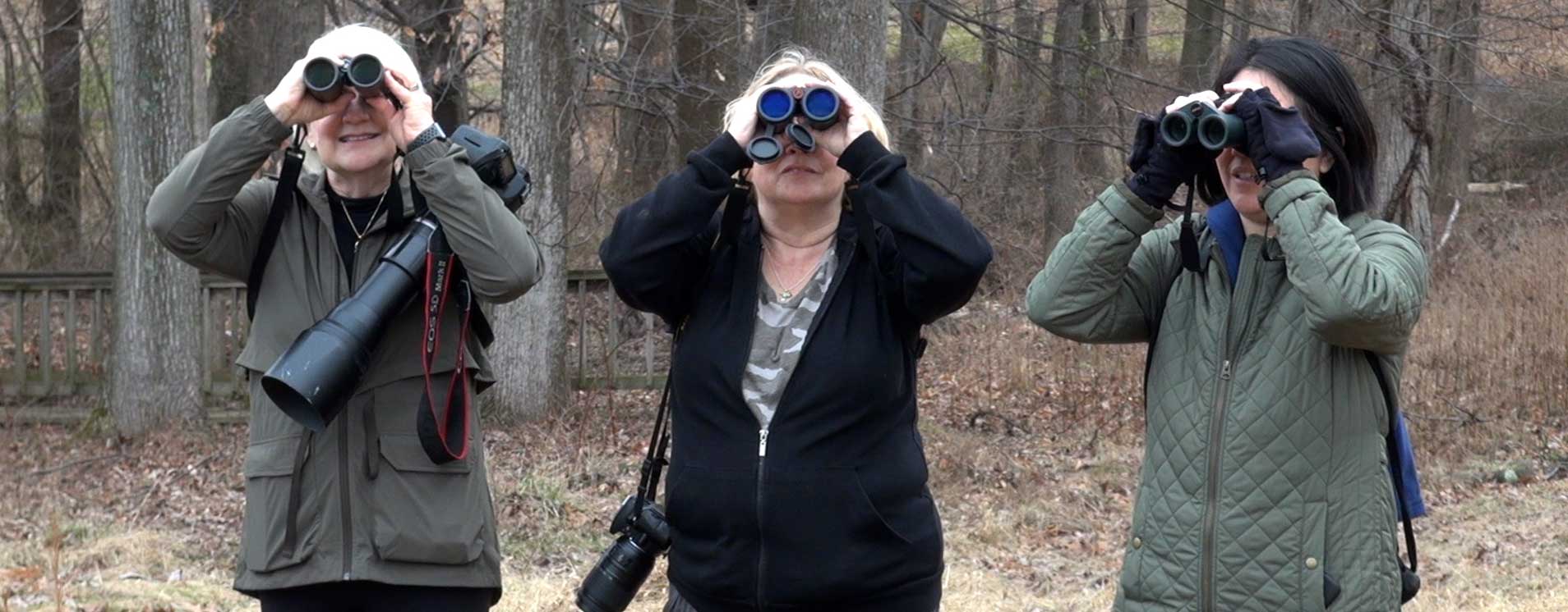 women with binoculars